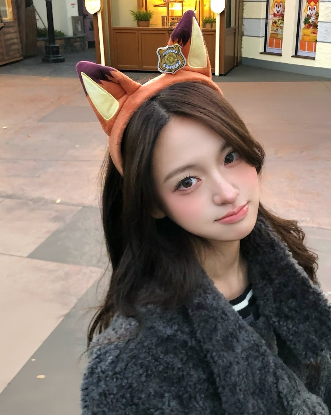 Photo by 주원 on December 18, 2025. May be an image of one or more people, hair, hat, fur, headdress, costume and text.