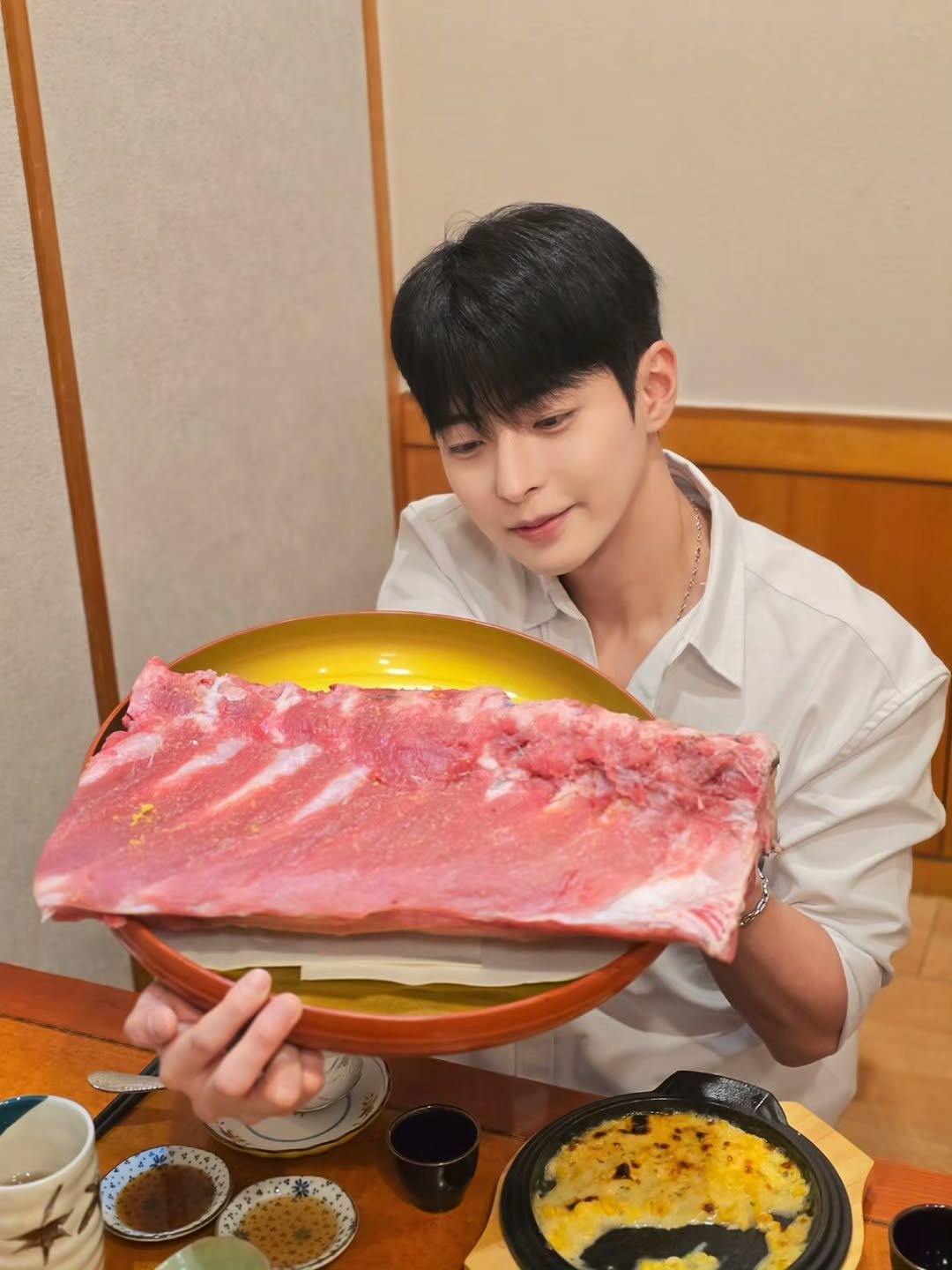 Photo shared by 장건우 on October 01, 2025 tagging @kimsushi1986. May be an image of 1 person, sashimi and text.