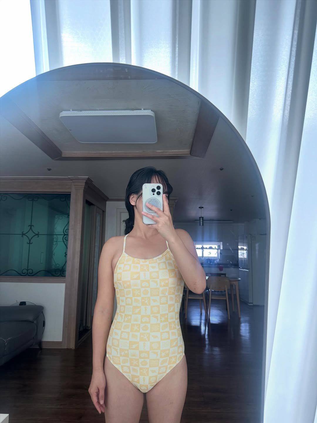 Photo shared by 콩이 on October 29, 2025 tagging @finebay_official. May be an image of wetsuit, halter top and text.