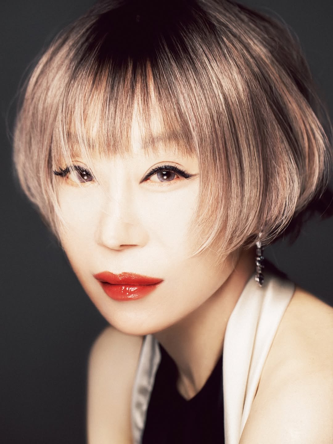 Photo shared by SM Classics on April 20, 2026 tagging @sumijo_official, and @smtown. May be an image of one or more people, bangs, blonde hair, makeup and text.