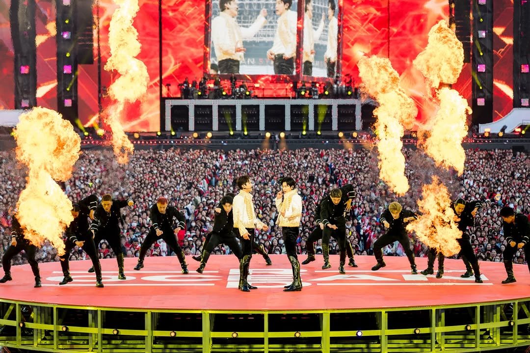 Photo shared by SM Entertainment Group on April 26, 2026 tagging @tvxq.official. May be pop art of fire, poster, crowd, concert and text.