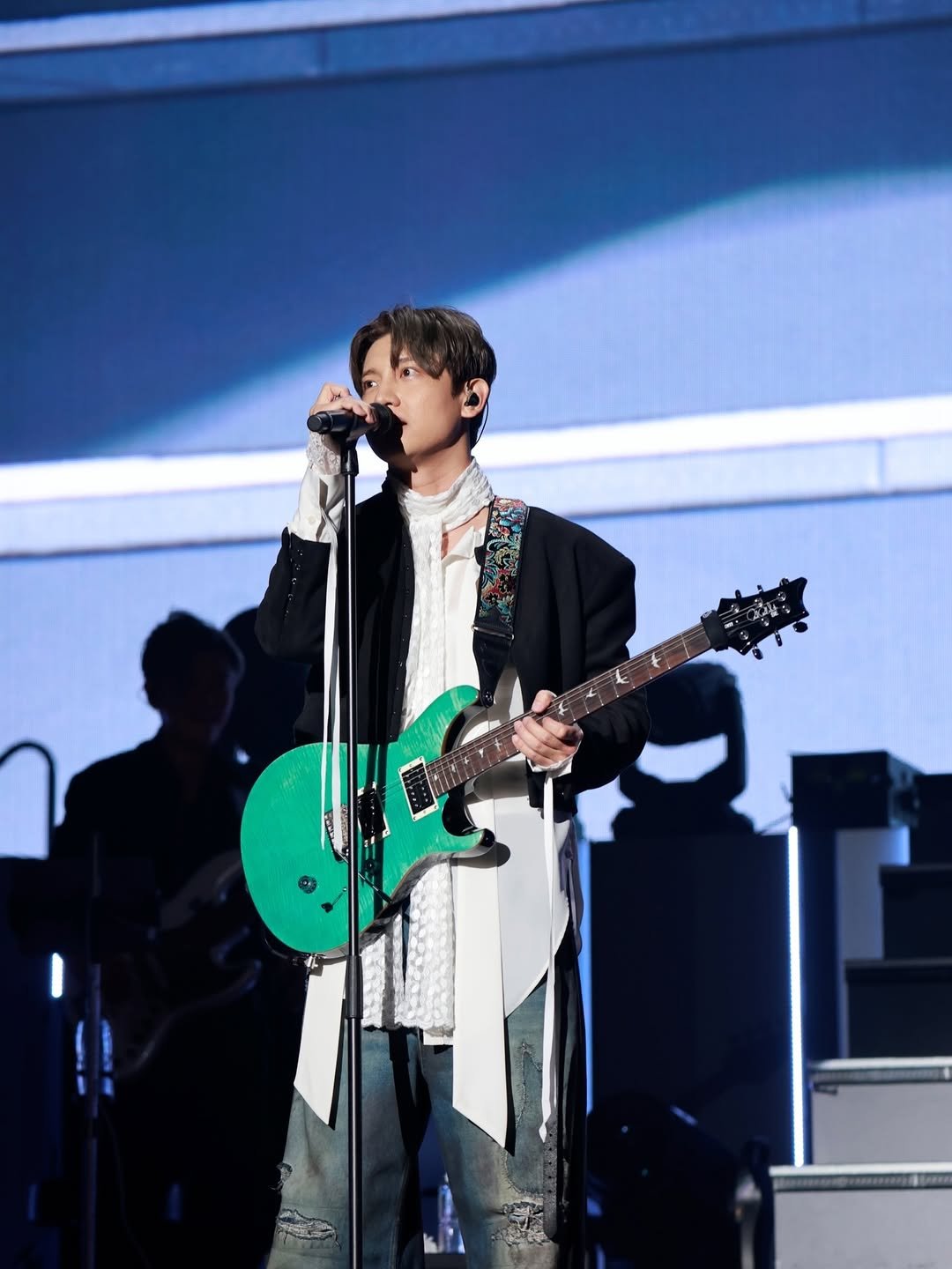 Photo shared by SM Entertainment Group on December 07, 2025 tagging @tvxq.official. May be an image of guitar, concert and text.