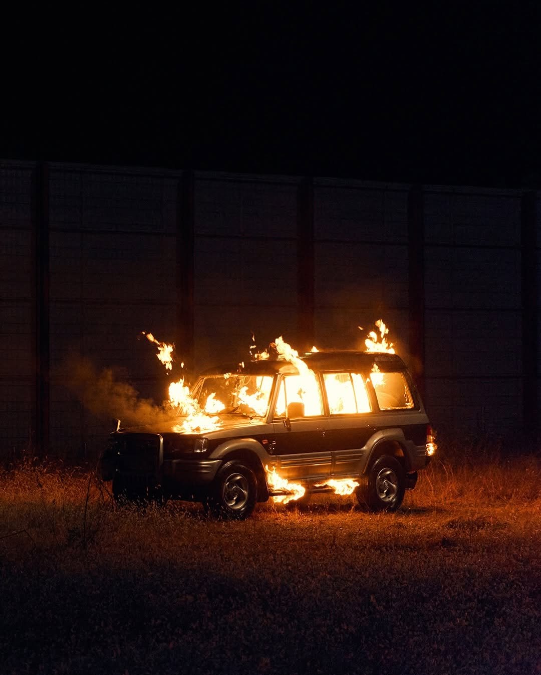 Photo by SM Entertainment Group on December 07, 2025. May be an image of fire, truck and text.