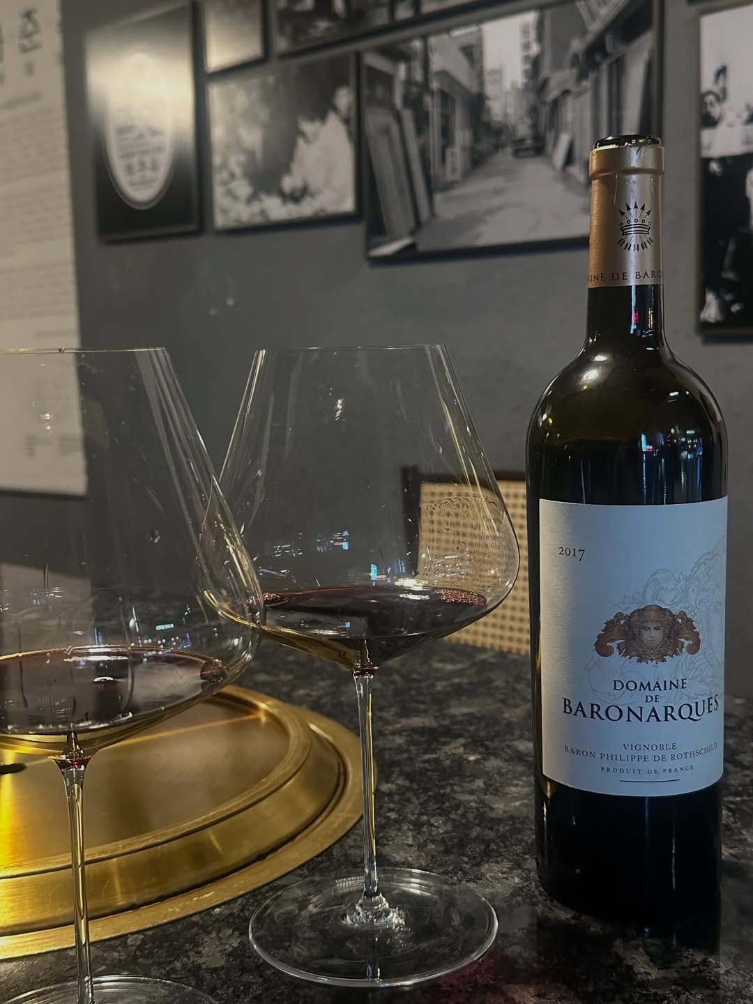 Photo by Misung on December 25, 2025. May be an image of wine, wine bottle, wine glass, silver oak tree and text.