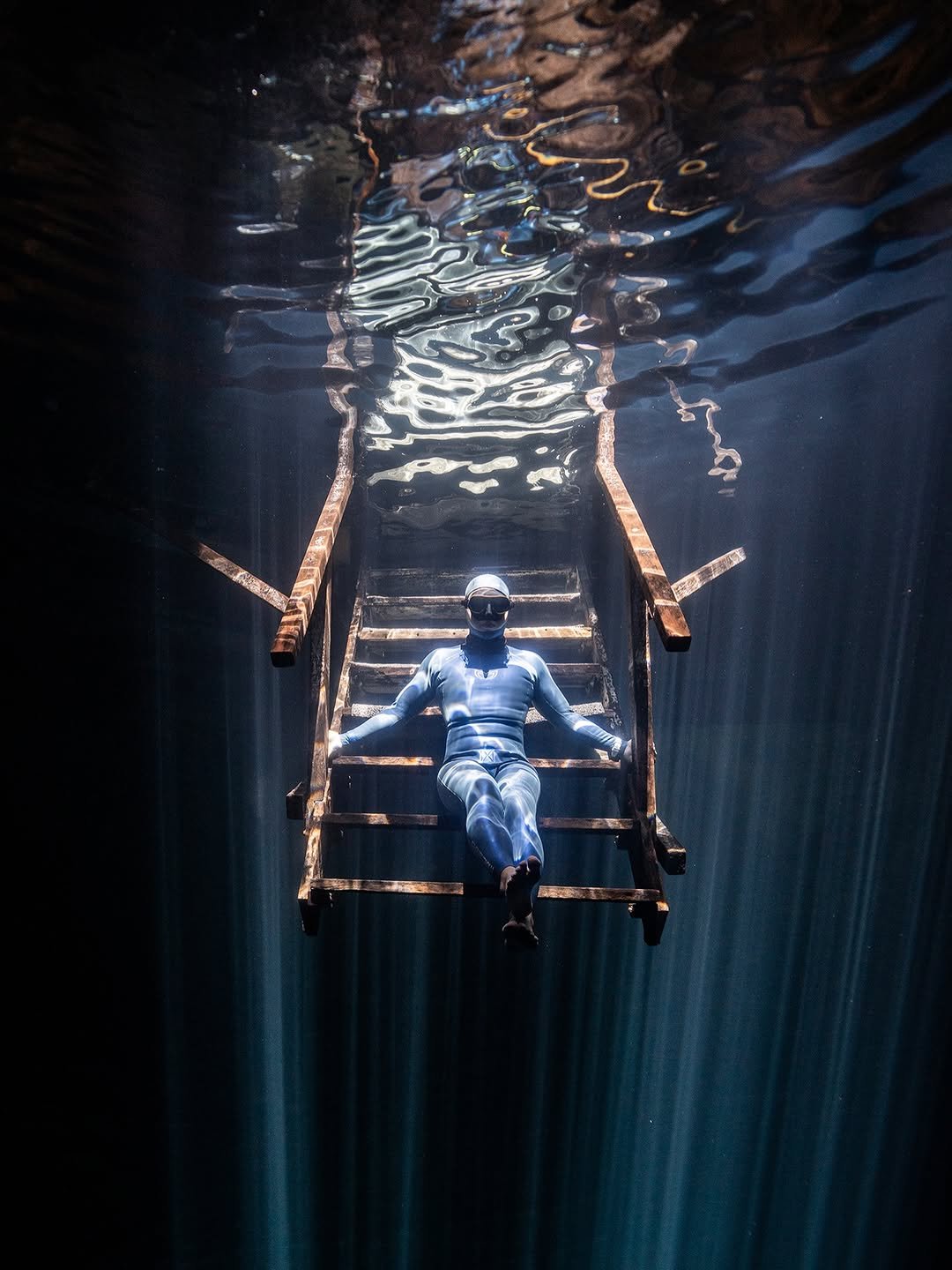 Photo shared by 이덕재 on February 20, 2026 tagging @underwatergraphy. May be an image of swimming, wetsuit, raft, the Blue Grotto and text.