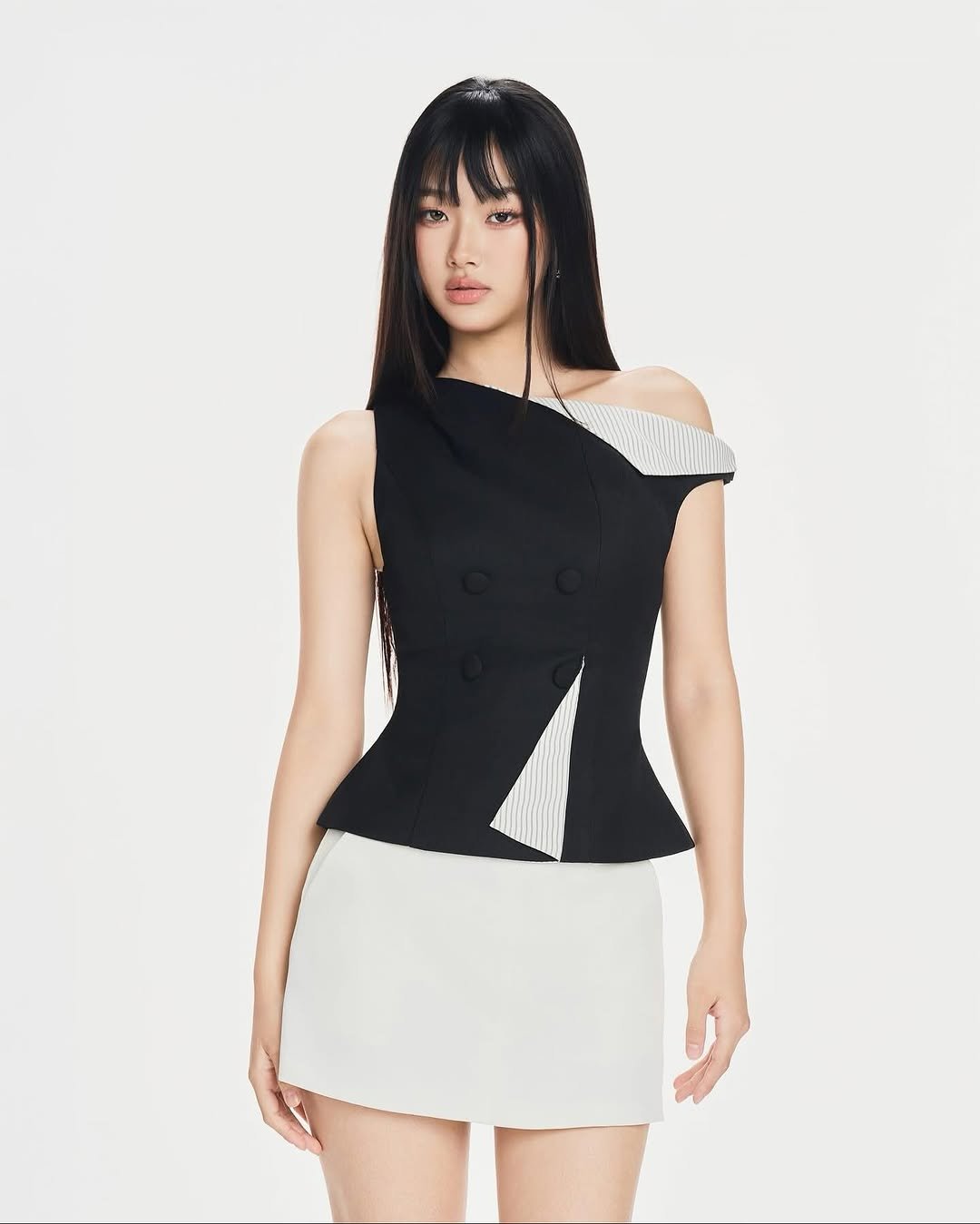 Photo by Julie 시연 on October 23, 2025. May be an image of skirt, dress, top, halter top and text.