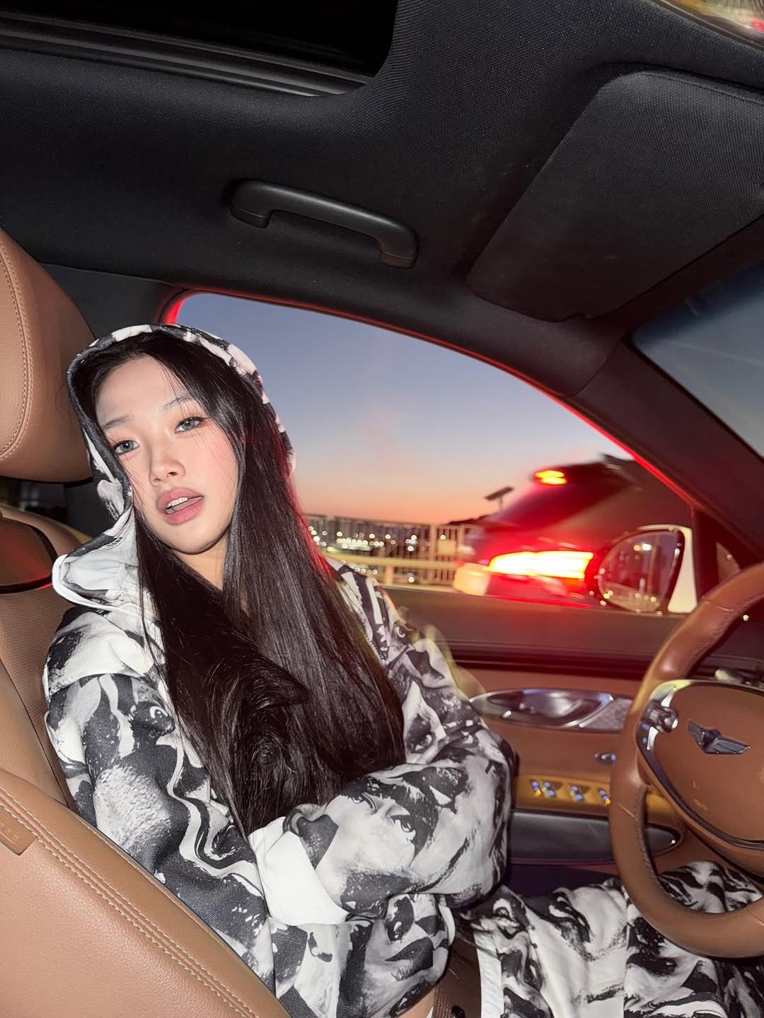 Photo by Julie 시연 on December 05, 2025. May be an image of one or more people, makeup, car, fishnet stockings and text.