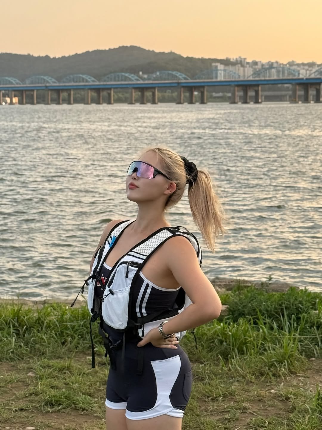 Photo shared by 희수 on August 10, 2025 tagging @wtdeyewear, @borntowin.co.kr, and @muscle_n_beauty_mnb_official. May be an image of 1 person, jumpsuit, shorts, outdoors and text.
