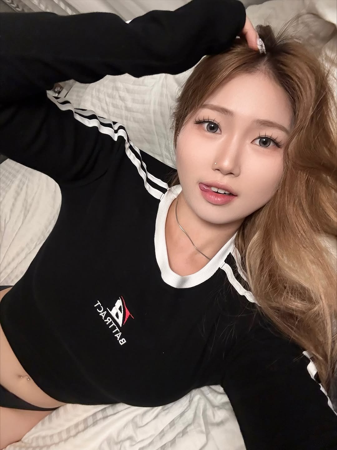 Photo shared by 희수 on November 13, 2025 tagging @battract_official. May be a selfie of one or more people, blonde hair, top, sweatshirt and text.