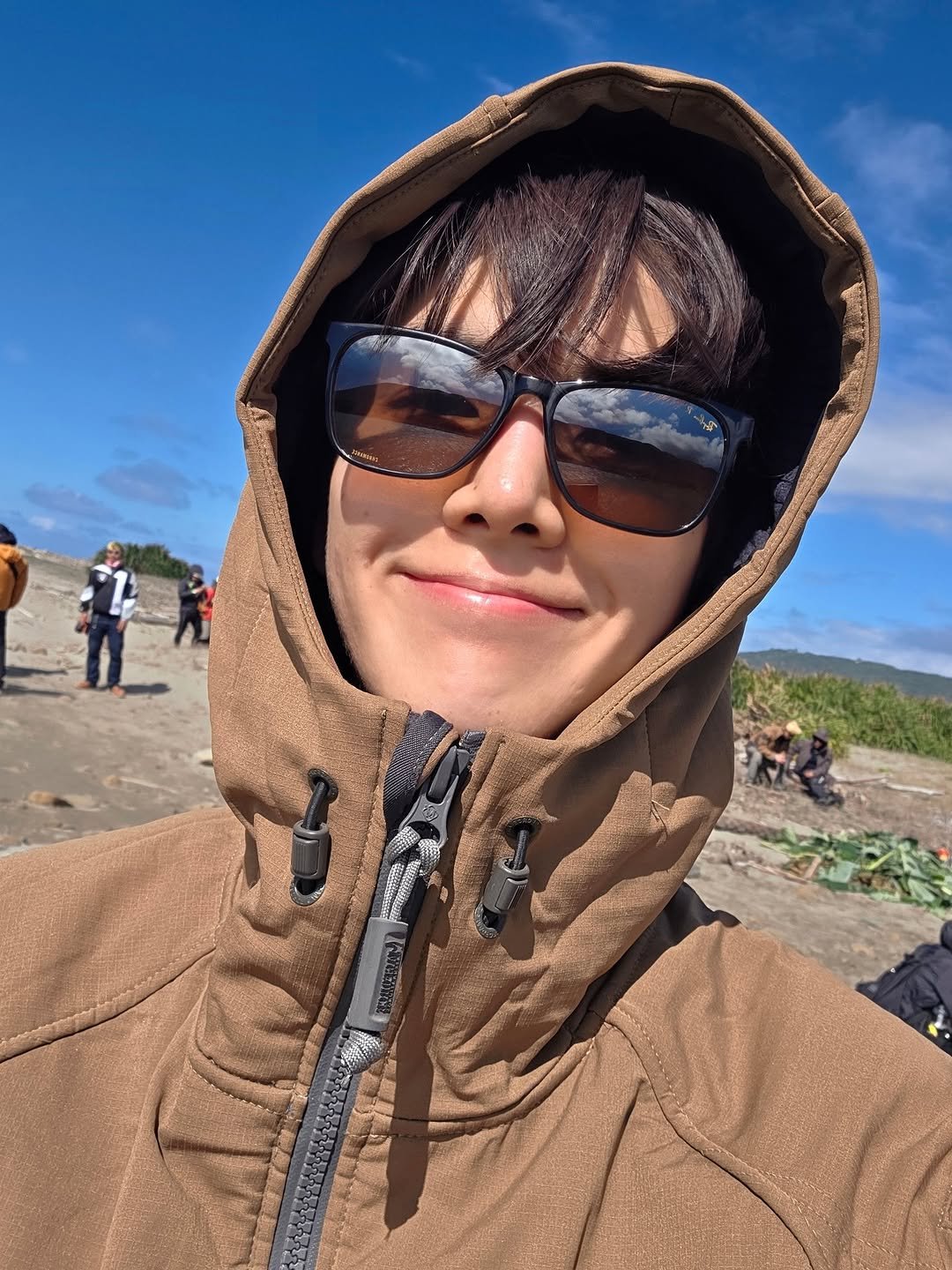 Photo by The boyz YH on February 05, 2026. May be an image of duffle coat, parka, glasses and raincoat.