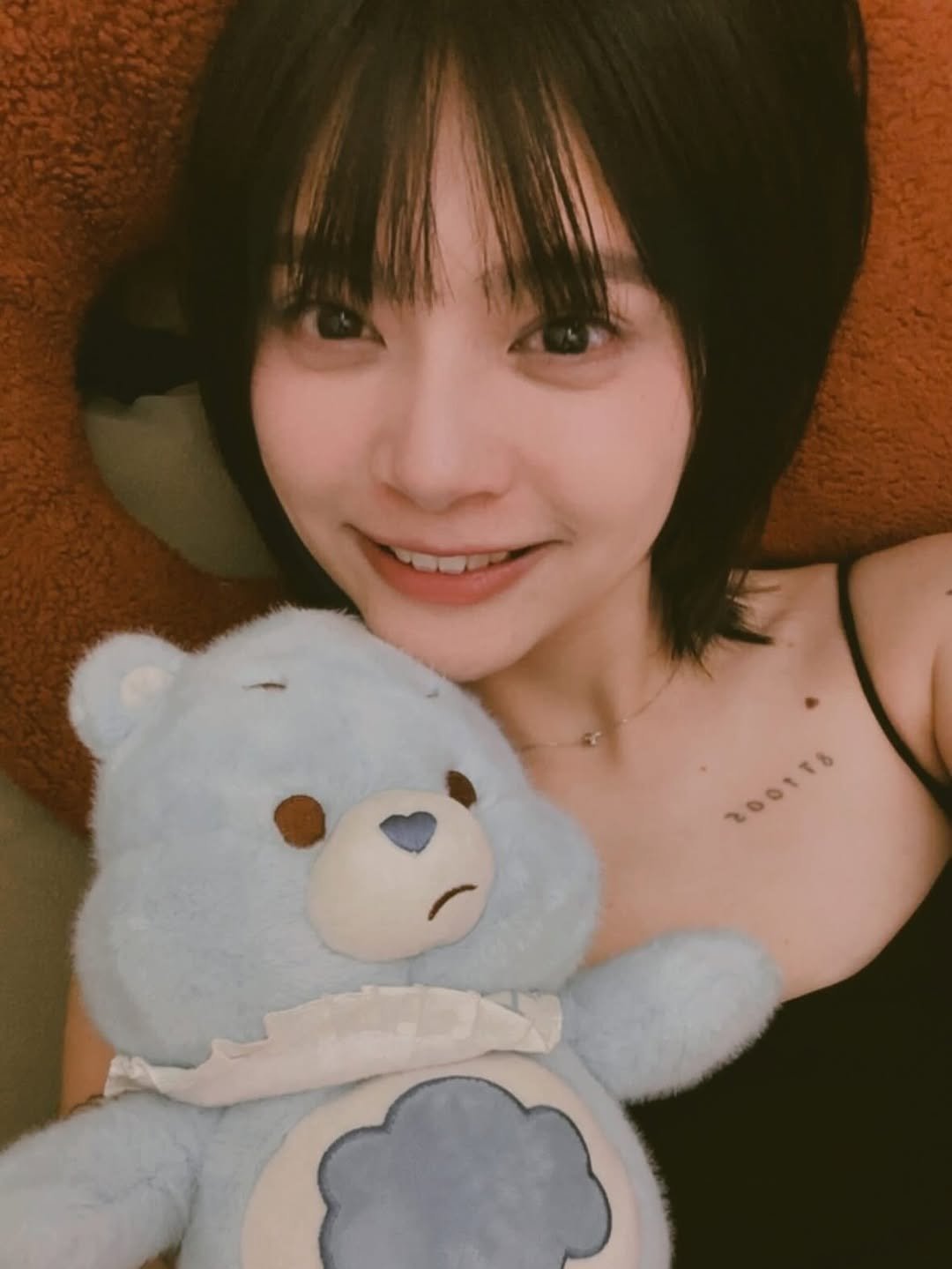 Photo by 曾珮晨 on April 19, 2026. May be an image of one or more people, hair, bear and text.