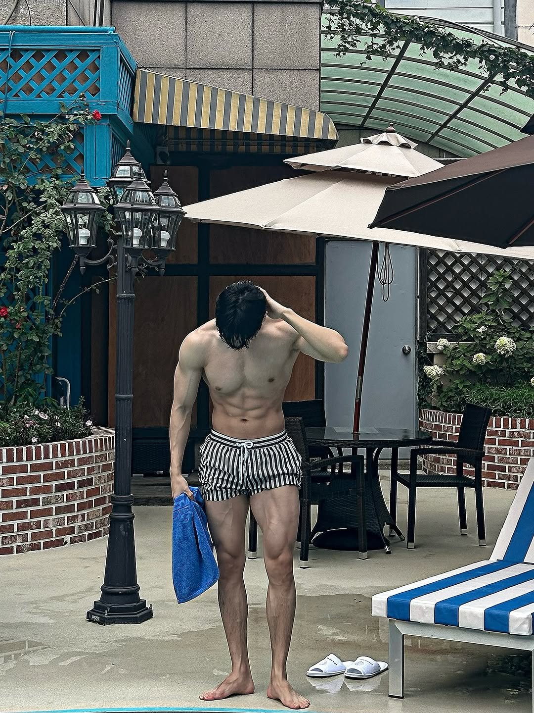 Photo by 김현중 on August 06, 2025. May be an image of 1 person, pool and text.