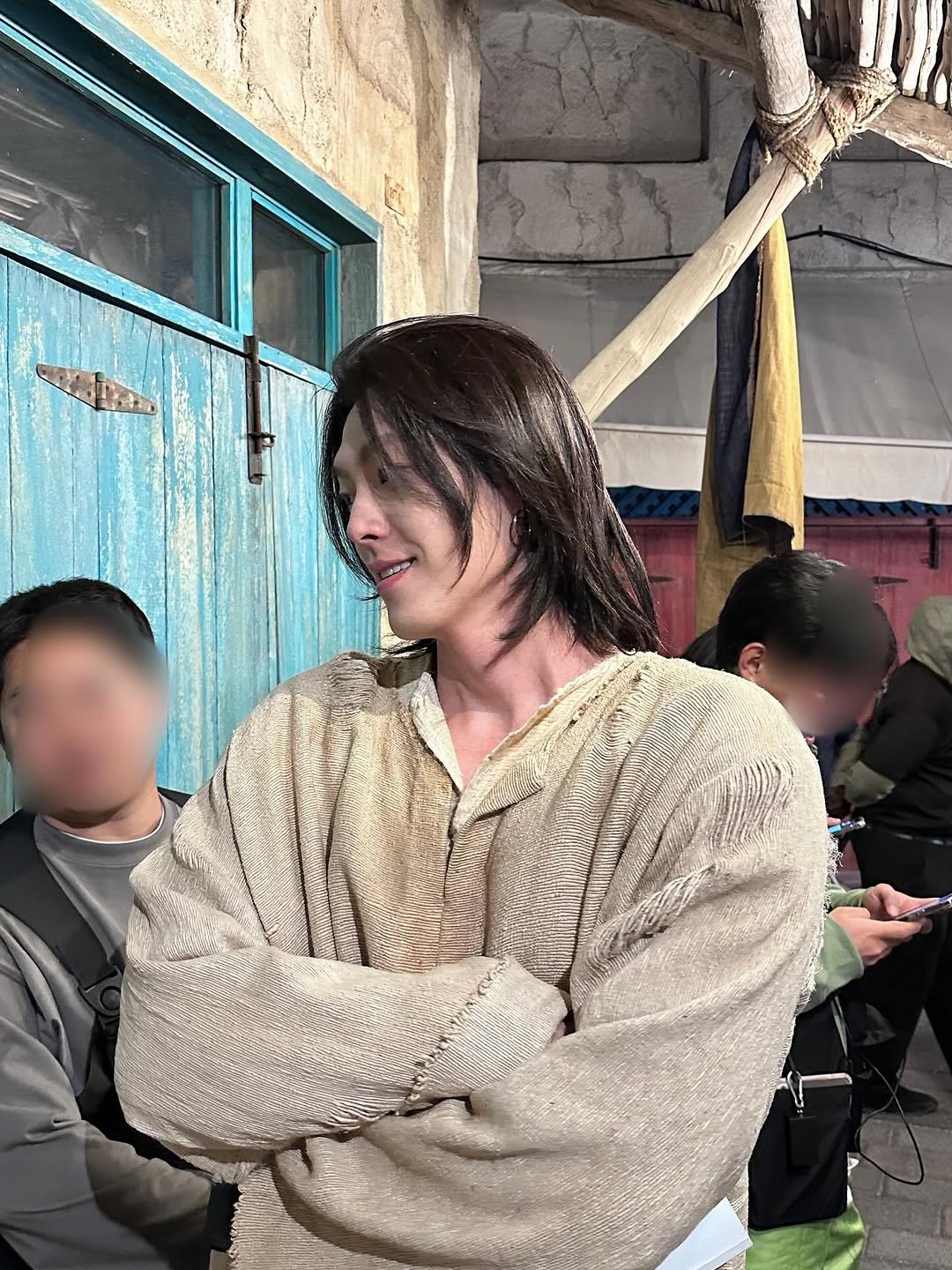 Photo by 김우빈 on October 16, 2025. May be an image of one or more people, costume and text.