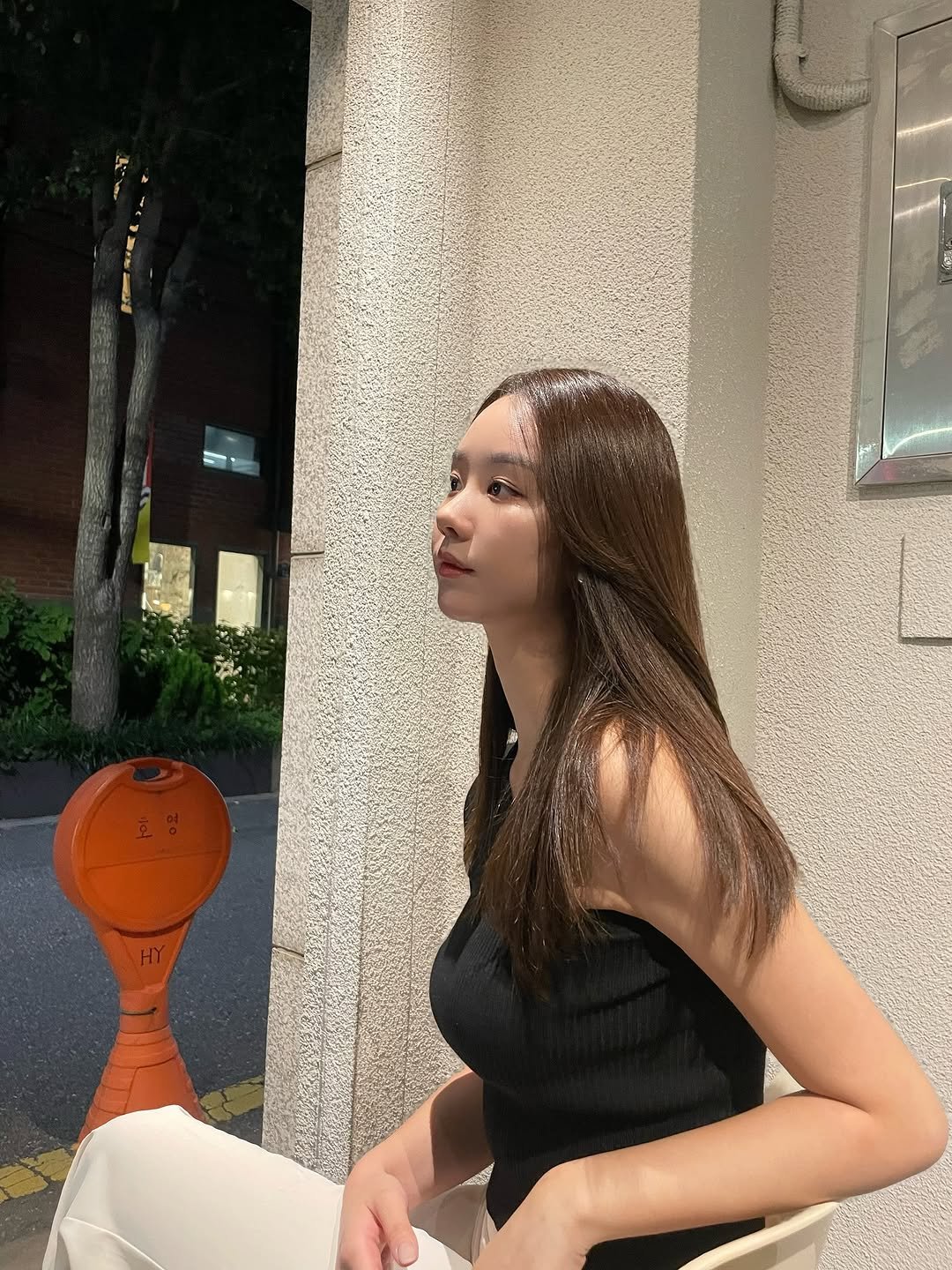 Photo by 최서안 on September 07, 2025. May be an image of 1 person, hair, outdoors and text.