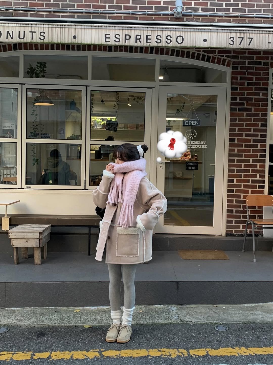 Photo shared by 알로하 on November 26, 2025 tagging @among_seoul. May be an image of duffle coat, overcoat, scarf, parka, sling, cornflower and text.