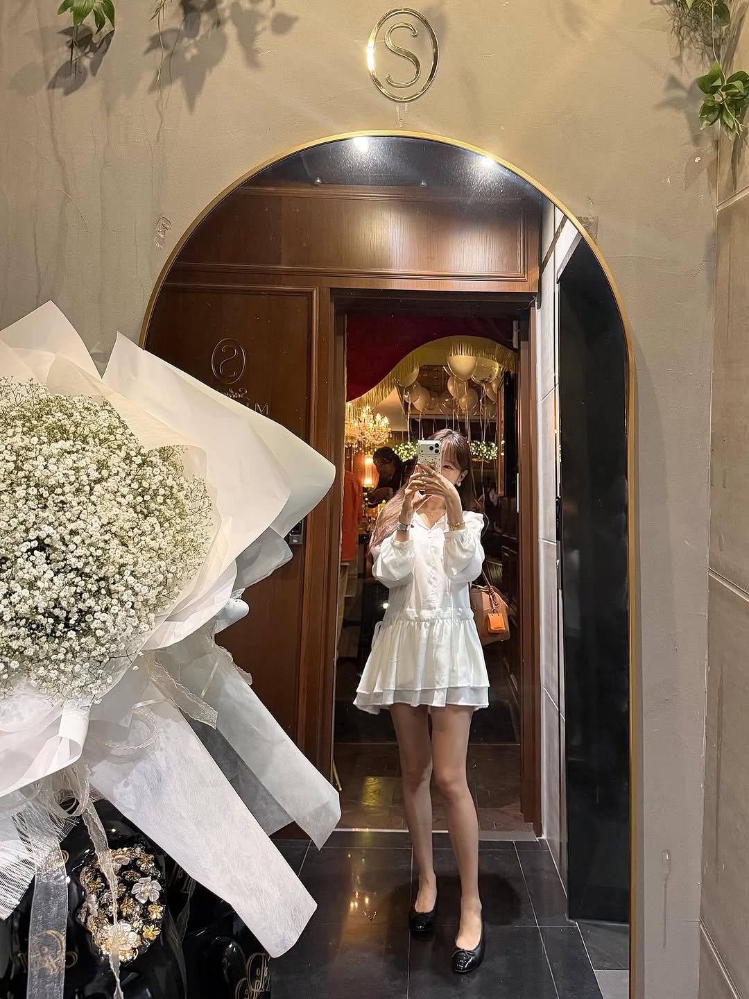 Photo by ᴇ ʟ ʟ ᴇ ɴ 🇰🇷🇨🇦 on April 22, 2026. May be an image of dress, flower arrangement, white lily, prairie gentian, baby's-breath, rose and text.