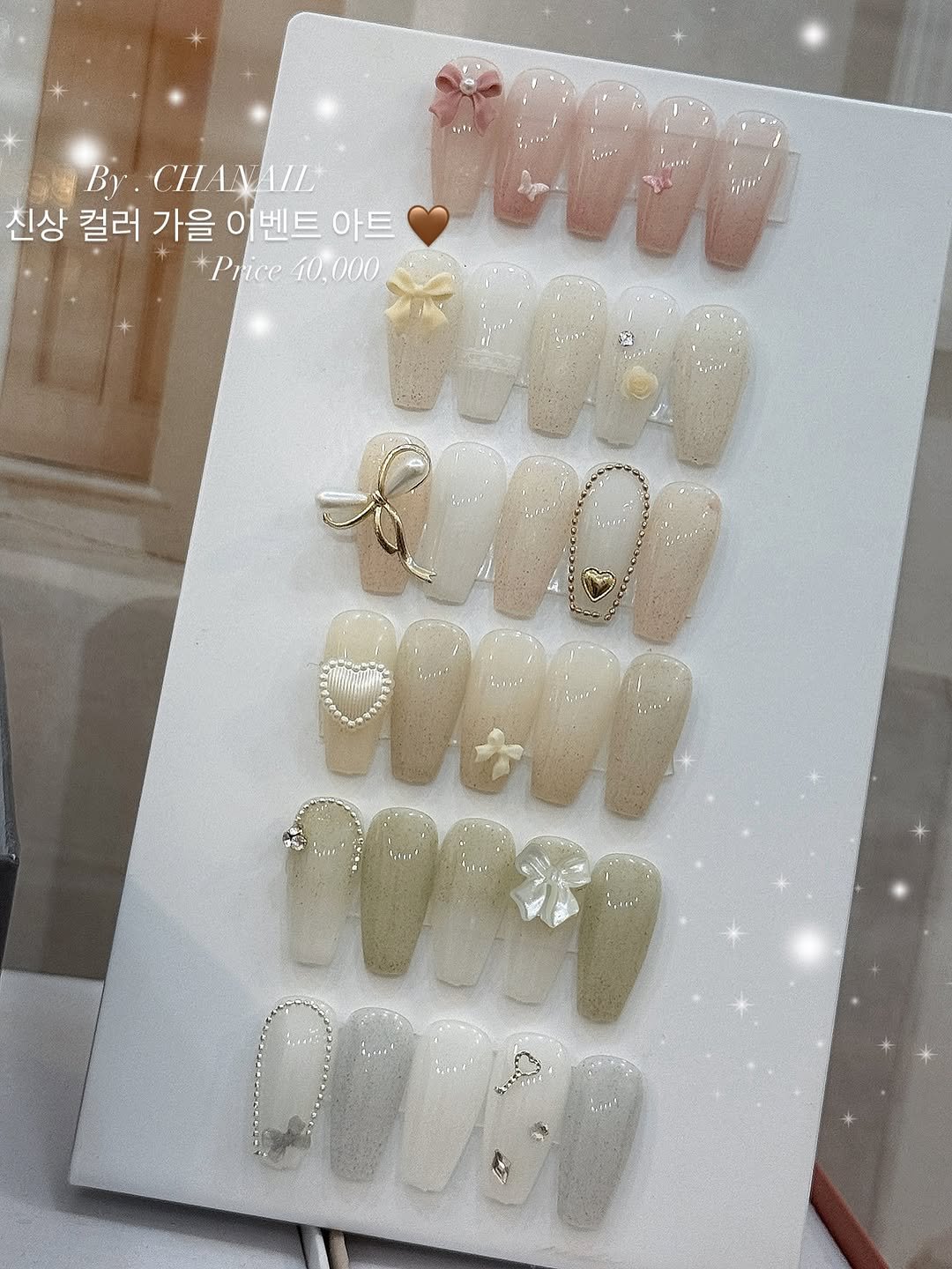 Photo by 수원네일 | 수원역네일 | 수원역 본점 • CHANAIL 샤네일🤎 on September 13, 2025. May be an image of ‎one or more people, fingernails and ‎text that says '‎H4F By. nAMA/Ι 신상 컬러 드상컬러가을이벤트아트 가을 0 러가을이벤트 이벤트아트 벤트 아트 *Price +Price40.000 10.000 اد 참산 U0 CUGW 0‎'‎‎.