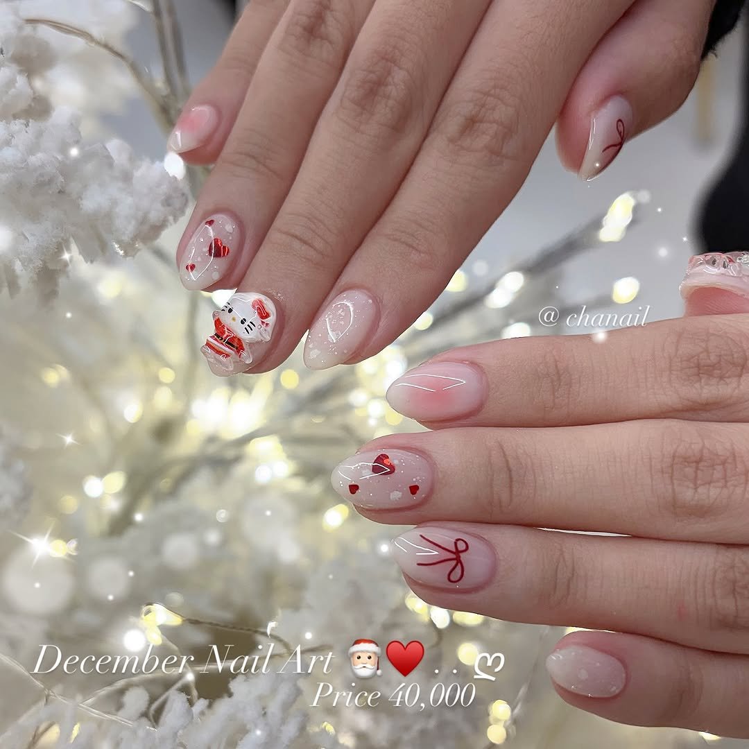 Photo by 수원네일 | 수원역네일 | 수원역 본점 • CHANAIL 샤네일🤎 in 수원역 로데오거리. May be an image of one or more people, fingernails and text that says 'em គ្ជាកប្ពុះ @ chanail December Nail DecemberNaitArt 1rt င Price40,000 40, 000 Price'.