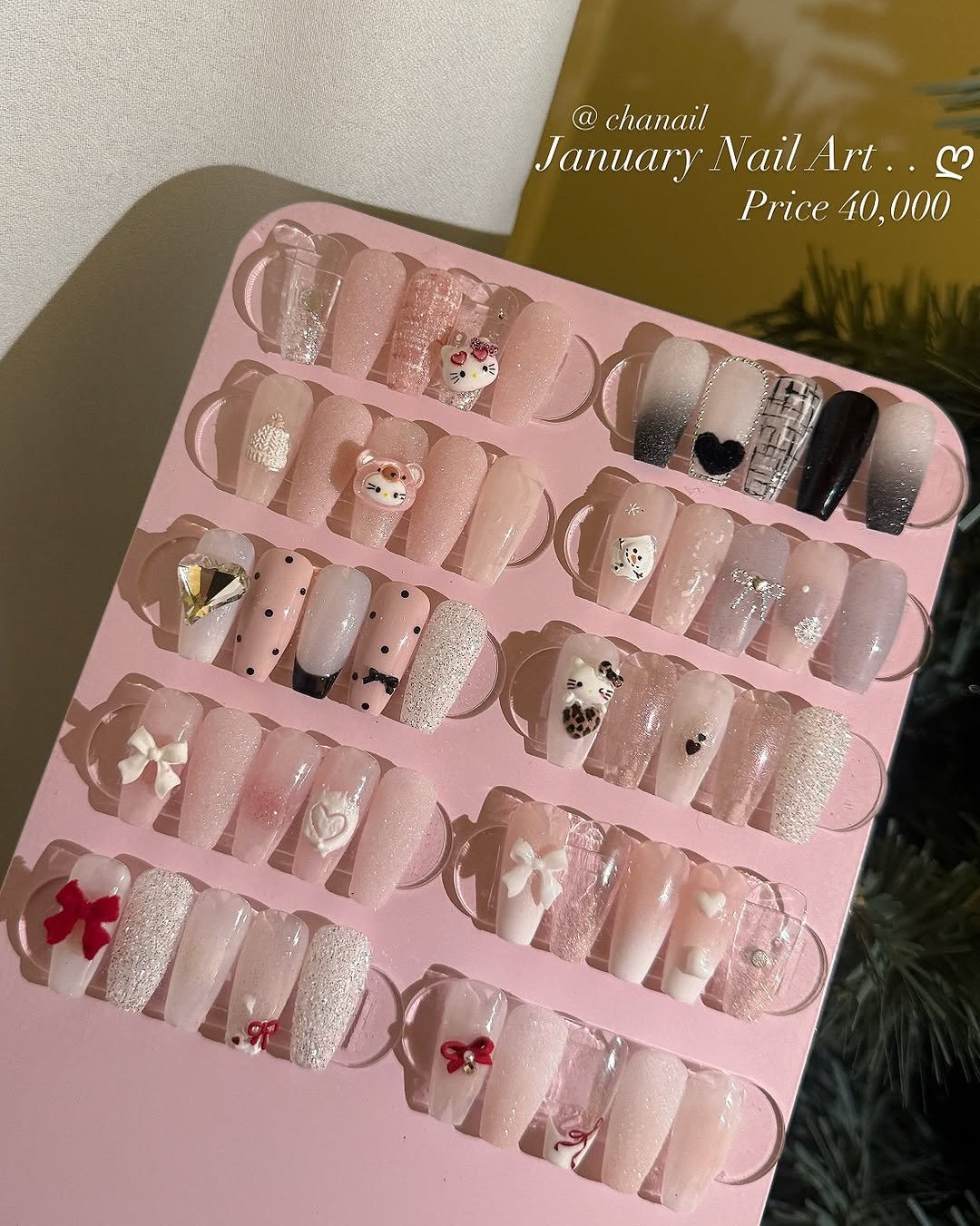 Photo by 수원네일 | 수원역네일 | 수원역 본점 • CHANAIL 샤네일🤎 on December 28, 2025. May be an image of one or more people, fingernails and text that says '@ chanail January Nail Art.. JanuaryNailArt.. ያ rt. Price40,000 Price 40,000 40,'.