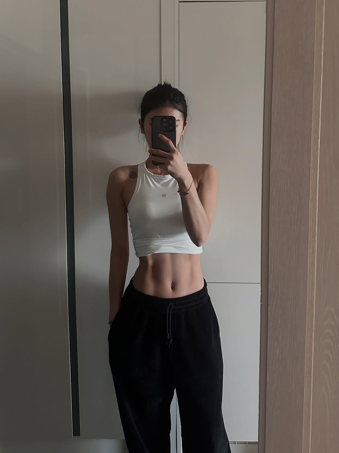 Photo by 염민경 on February 16, 2026. May be an image of sweatpants, sportswear, mirror and text.