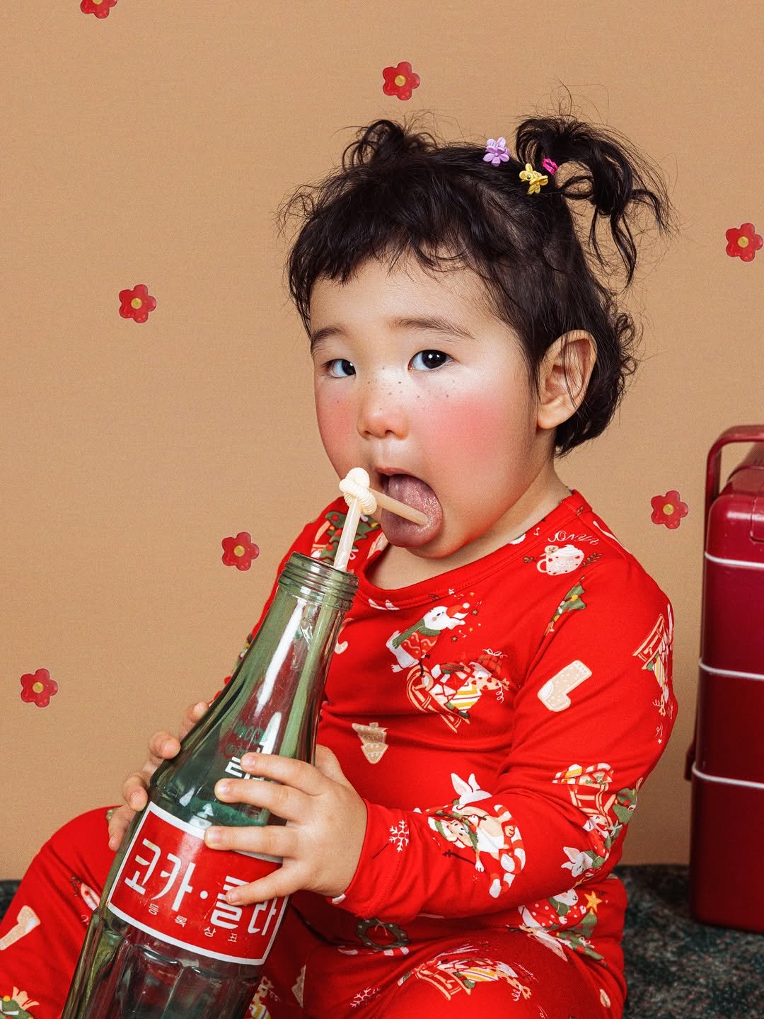 Photo shared by 랄랄 on December 26, 2025 tagging @seobangeee. May be an image of baby, bottle and text.
