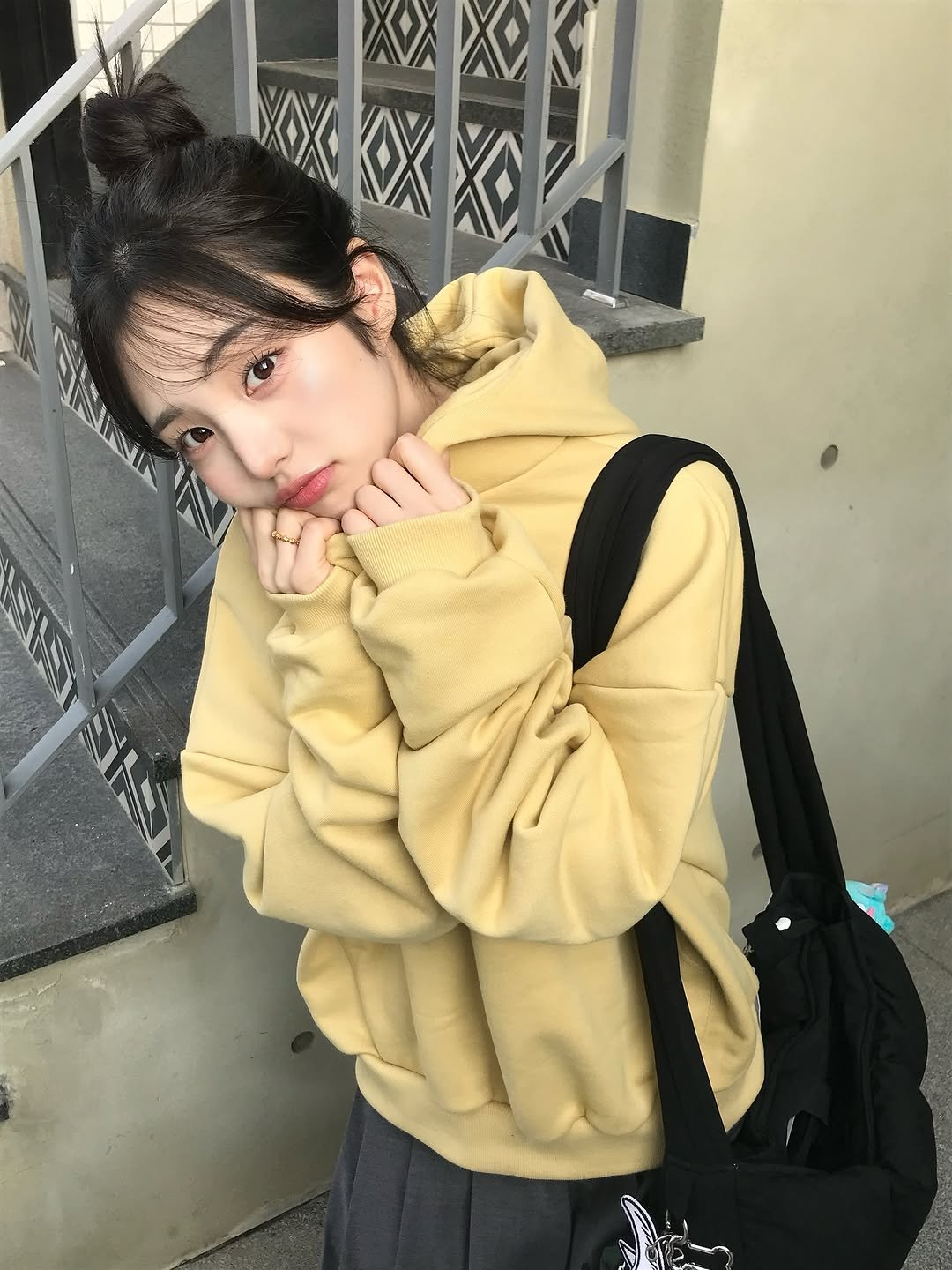 Photo by 소이 on October 03, 2025. May be an image of 1 person, hair, duffle coat, parka and text.