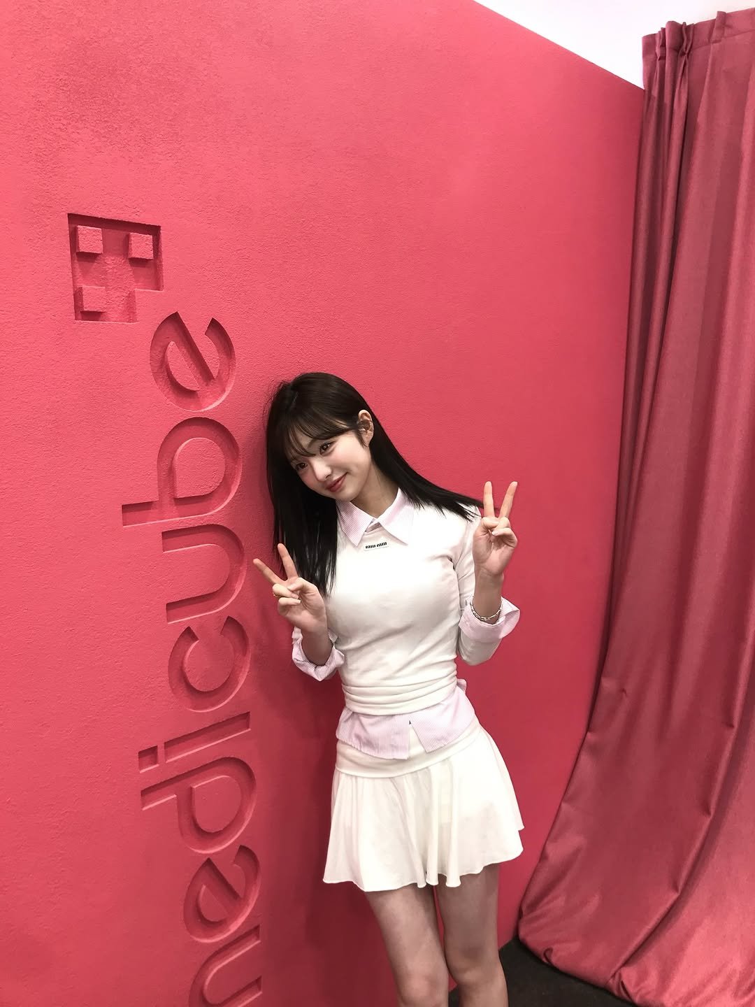 Photo shared by 소이 on December 14, 2025 tagging @medicube_korea. May be an image of top, miniskirt, costume and text.