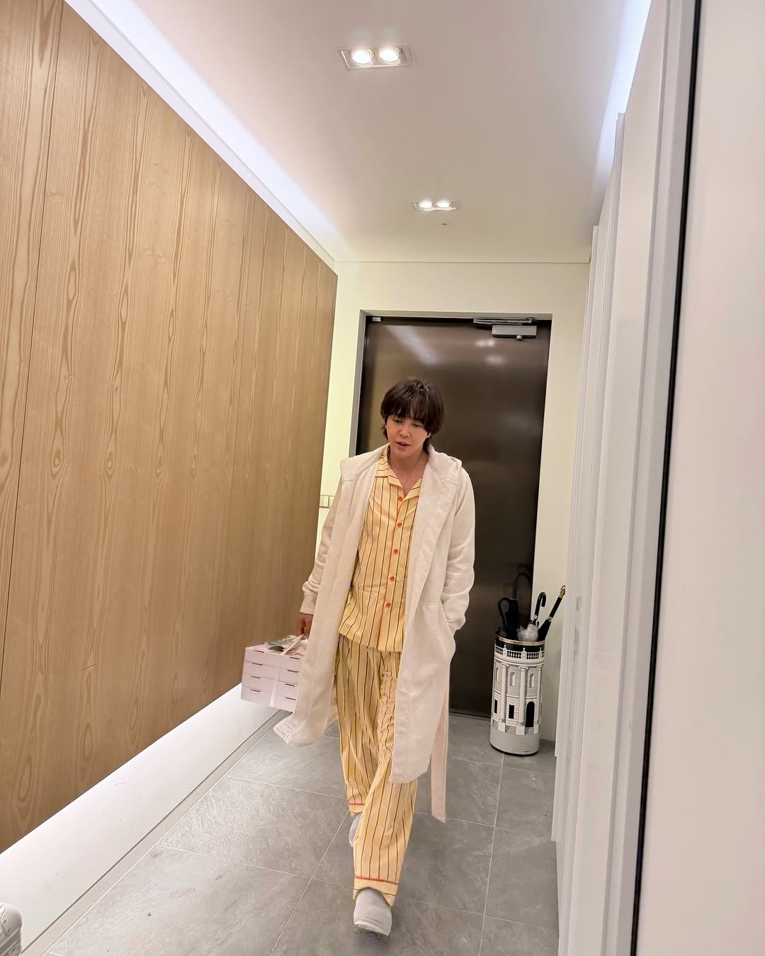 Photo by 장근석 Jang Keun-suk on February 28, 2026. May be an image of sleepwear, bath robe, sweatpants, robe and text.