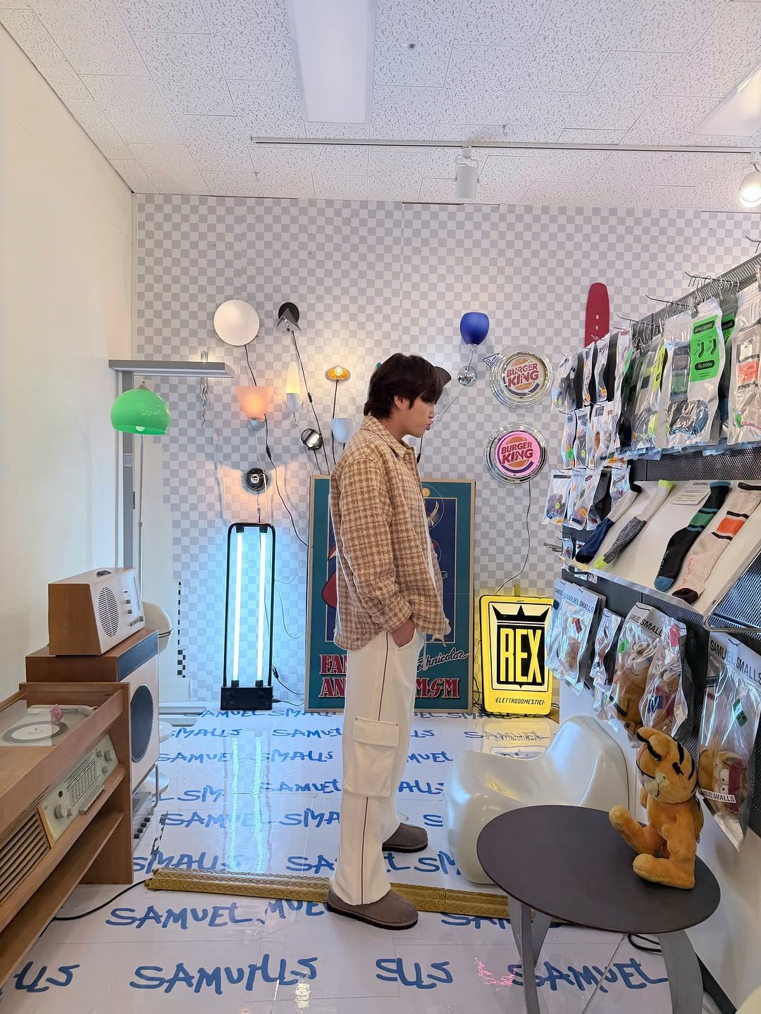 Photo by 장근석 Jang Keun-suk on March 28, 2026. May be an image of duffle coat, display case, bolo tie, cornflower and text.