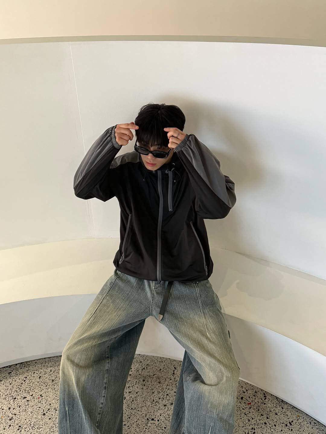 Photo by 김용빈 / 유포어 on September 12, 2025. May be an image of 1 person, duffle coat, sweatpants and text.
