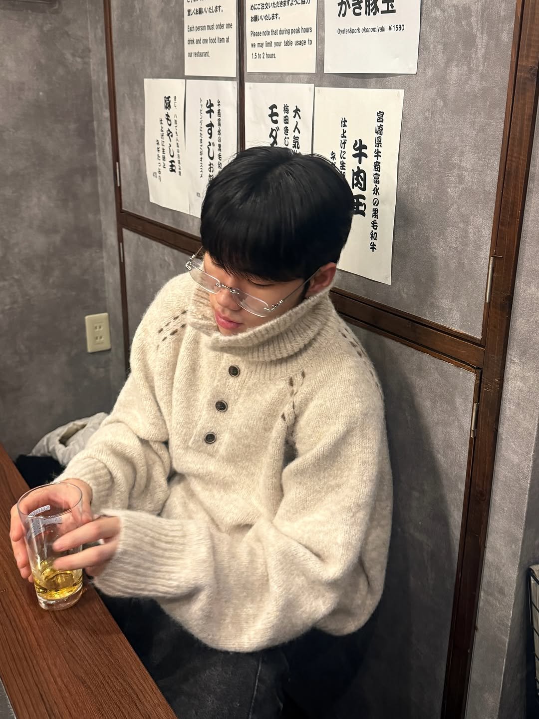 Photo by 김용빈 / 유포어 on December 02, 2025. May be an image of duffle coat, turtleneck and text.