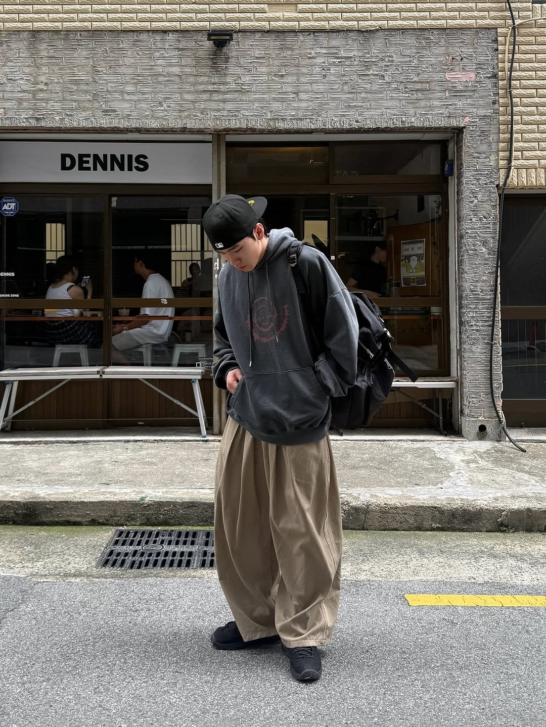 Photo by 김용빈 / 유포어 on August 22, 2025. May be an image of 5 people, kilt, street and text.