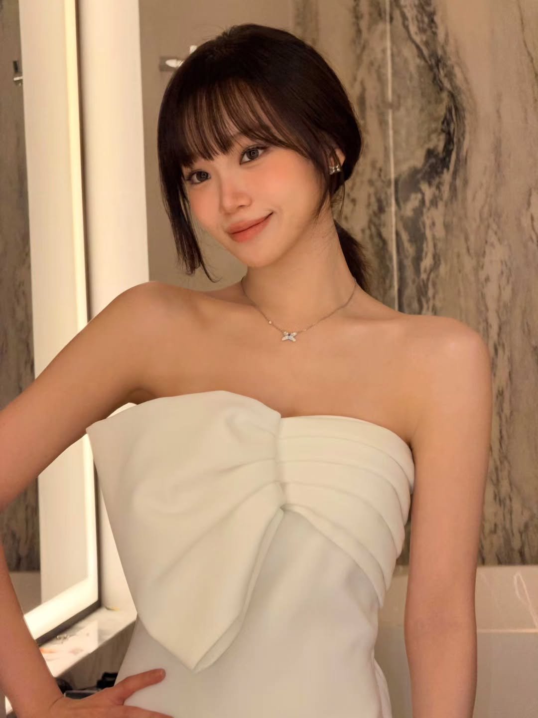 Photo by 김채원 (CHAEWON) on December 26, 2025. May be an image of one or more people, hair, dress and text.