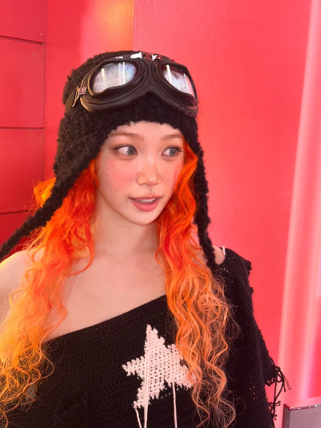 Photo by 김채원 (CHAEWON) on October 26, 2025. May be an image of one or more people, braids, hat, beret, headdress, fishnet stockings, glasses and text.