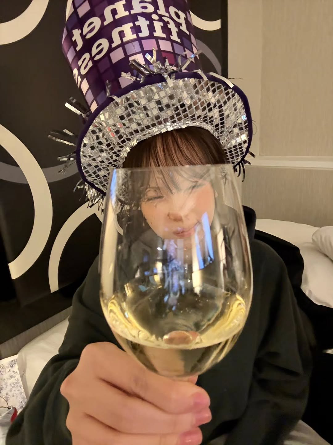 Photo by 김채원 (CHAEWON) on January 01, 2026. May be an image of champagne and text.