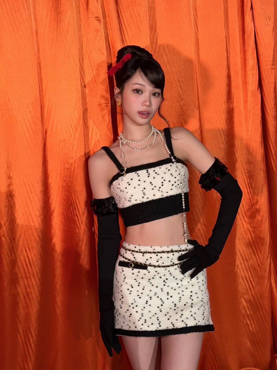 Photo by 김채원 (CHAEWON) on December 31, 2025. May be an image of costume, fishnet stockings, dress and text.