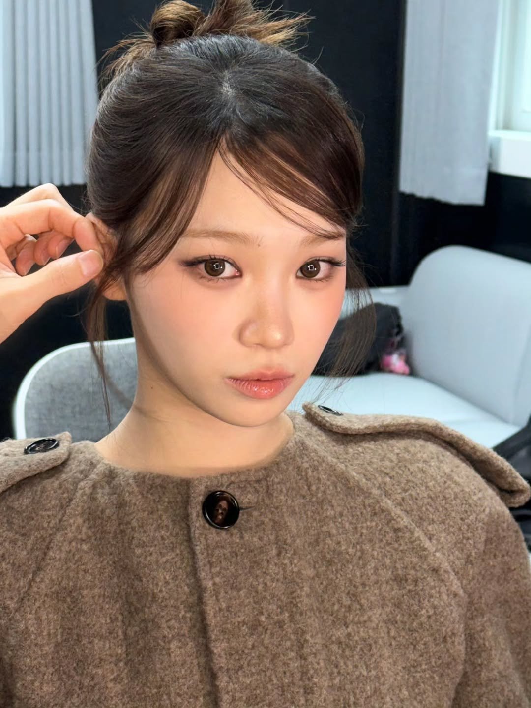 Photo by 김채원 (CHAEWON) on November 24, 2025. May be an image of one or more people, bangs and text.