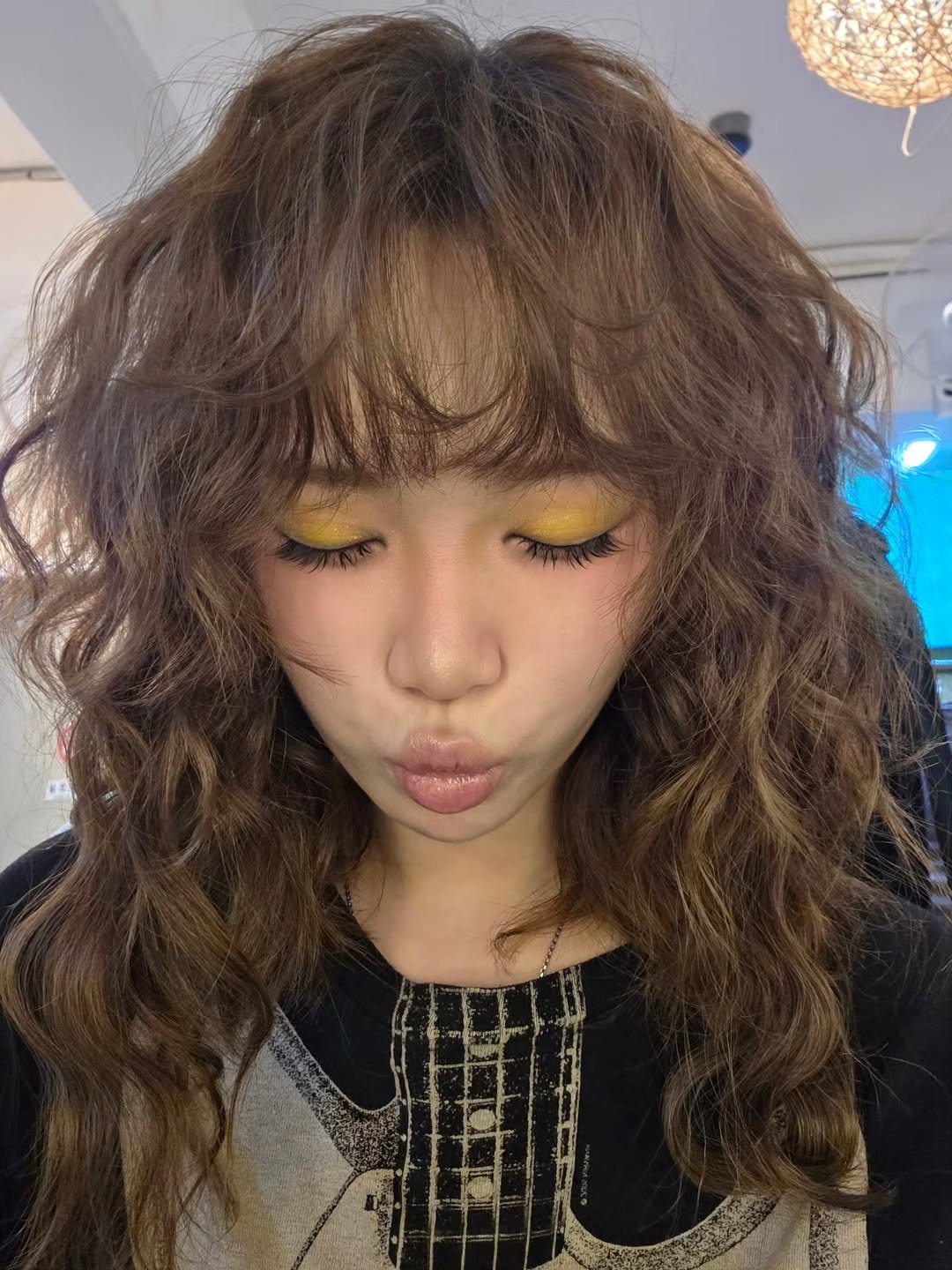 Photo by 김채원 (CHAEWON) on October 21, 2025. May be an image of one or more people, bangs, braids, blonde hair and text.