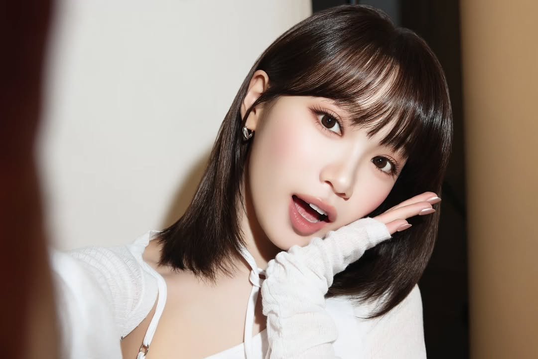 Photo by 김채원 (CHAEWON) on March 06, 2026. May be an image of one or more people, hair and text.