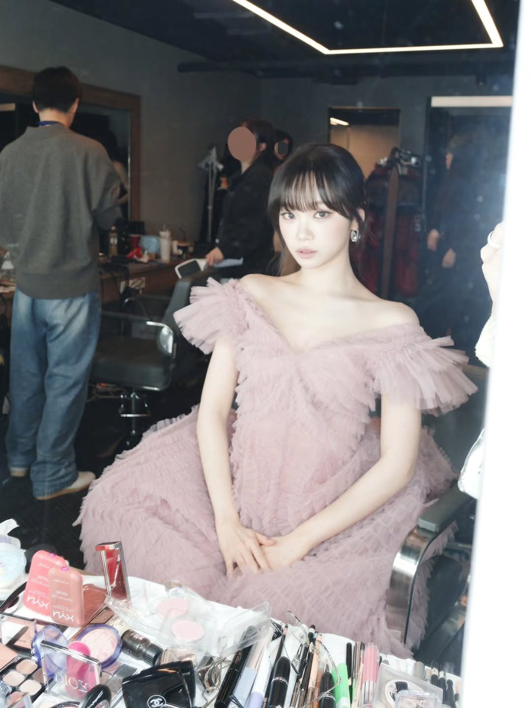 Photo by 김채원 (CHAEWON) on January 10, 2026. May be an image of one or more people, makeup, hair, dress and text.