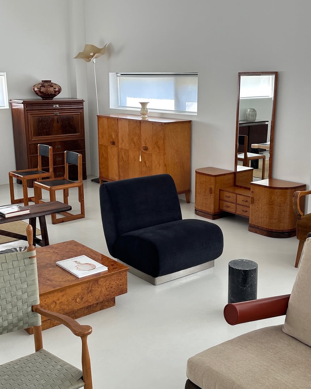 Photo by COLLECTION OF in Collection Of. May be an image of credenza, armchair, sofa, ottoman, chaise lounge, living room, indoors and text.