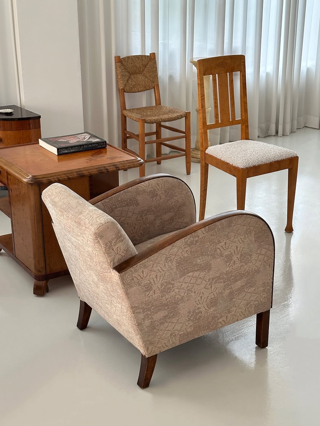 Photo by COLLECTION OF in Collection Of. May be an image of table, chair, chaise lounge, armchair, indoors and text.