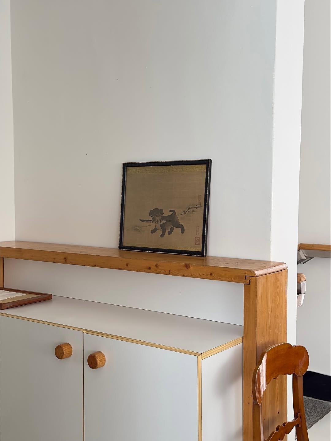 Photo by COLLECTION OF on October 23, 2025. May be an image of shelf, cabinet, bureau, indoors and text.