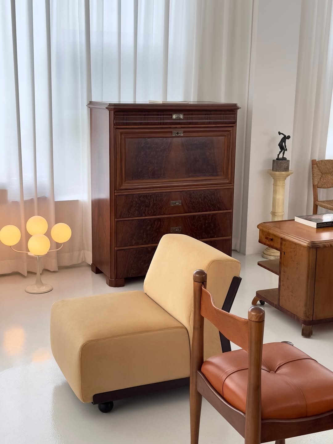 Photo by COLLECTION OF in Collection Of. May be an image of credenza, armchair, footstool, armoire, bureau, chair, indoors and text.