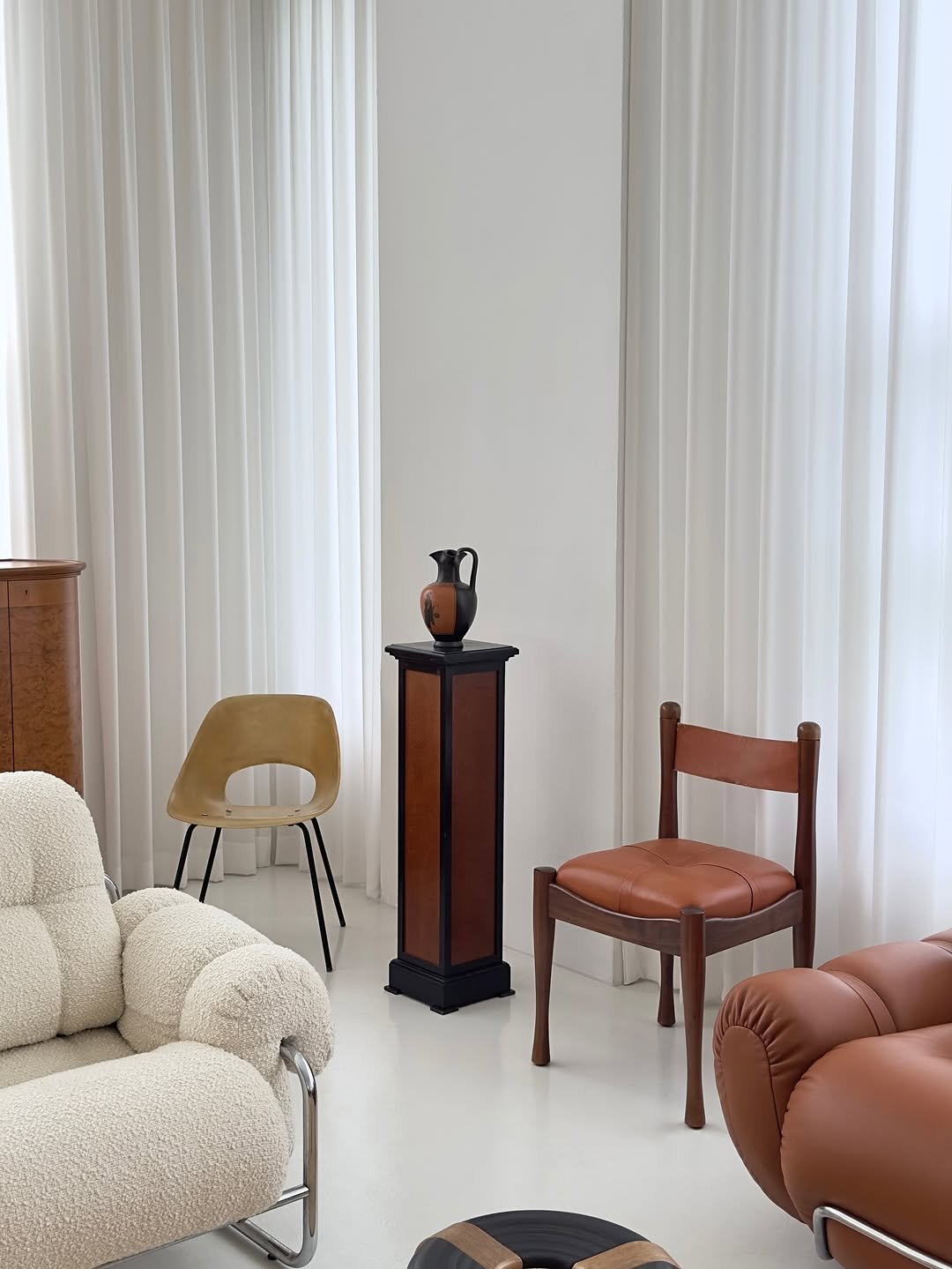 Photo by COLLECTION OF on August 18, 2025. May be an image of sink, armchair, chaise lounge, chair, indoors and text.