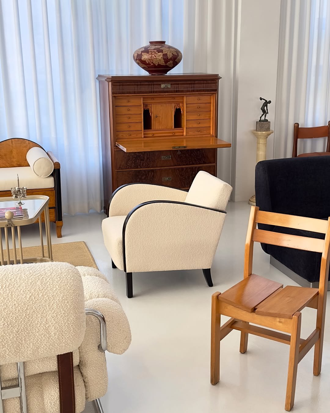 Photo by COLLECTION OF in Collection Of. May be an image of footstool, armoire, armchair, chair, indoors and text.