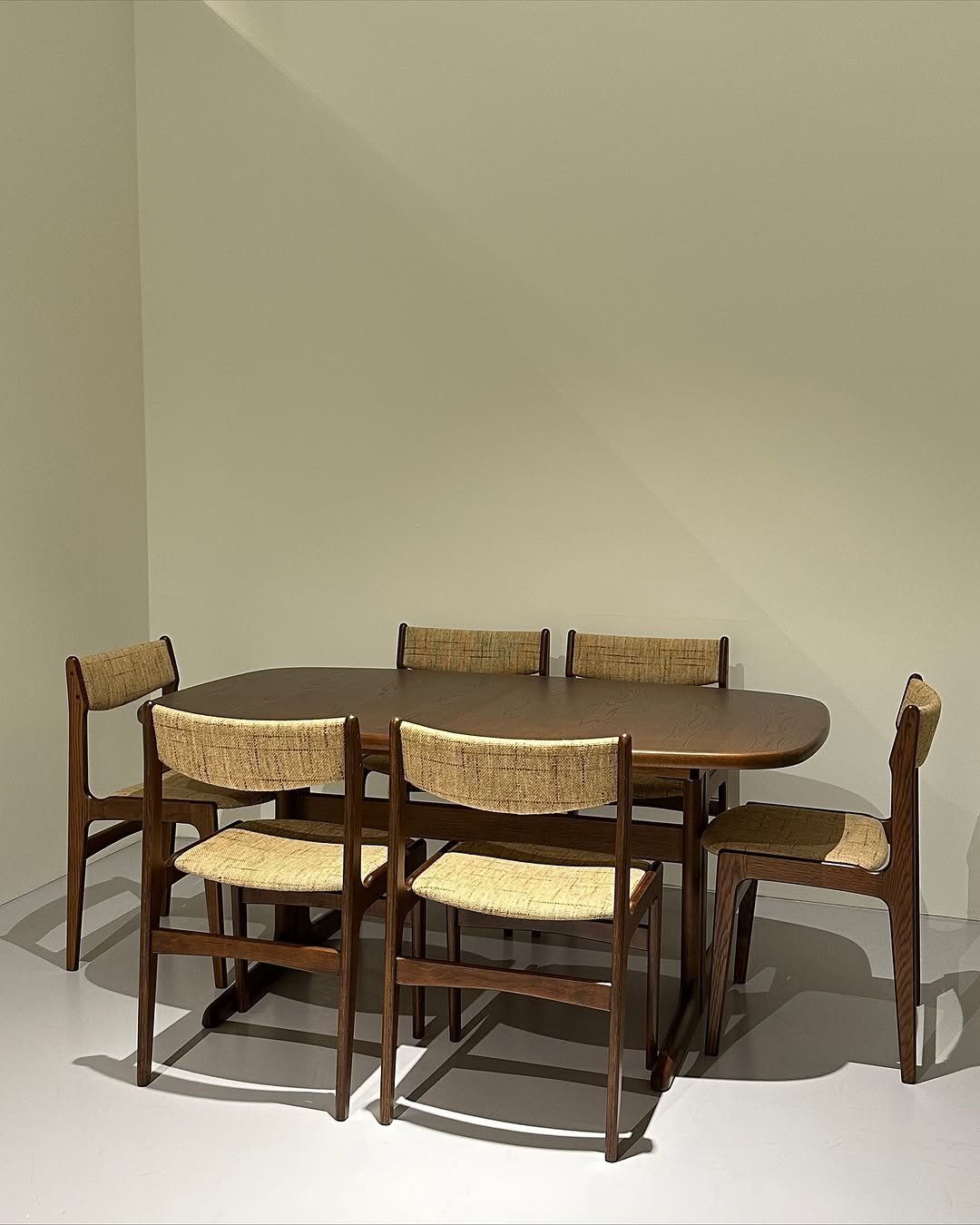 Photo by COLLECTION OF on November 13, 2025. May be an image of table, armchair, dining table and text.