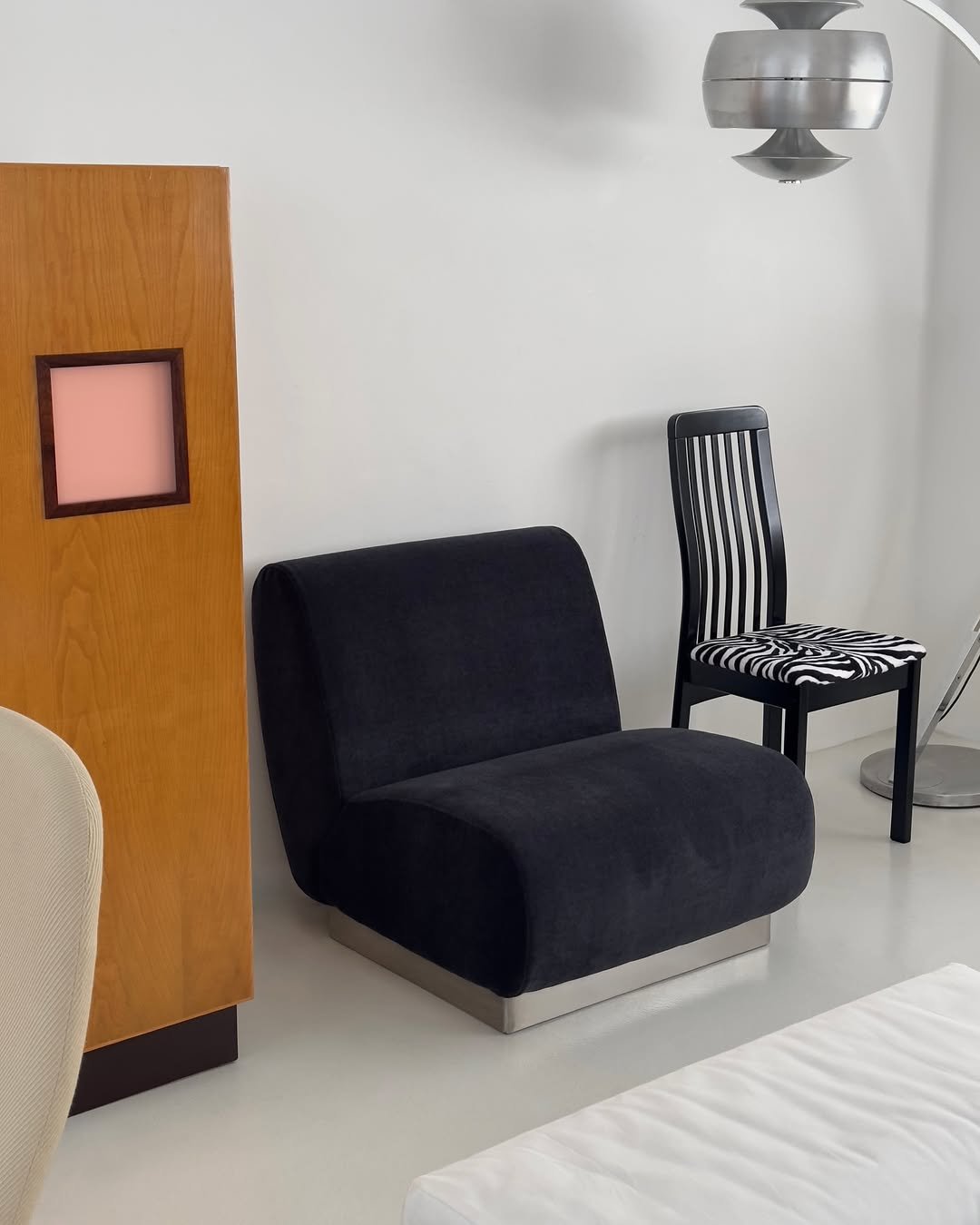 Photo by COLLECTION OF in Collection Of. May be an image of armchair, sofa, chaise lounge, chair, indoors, office and text.