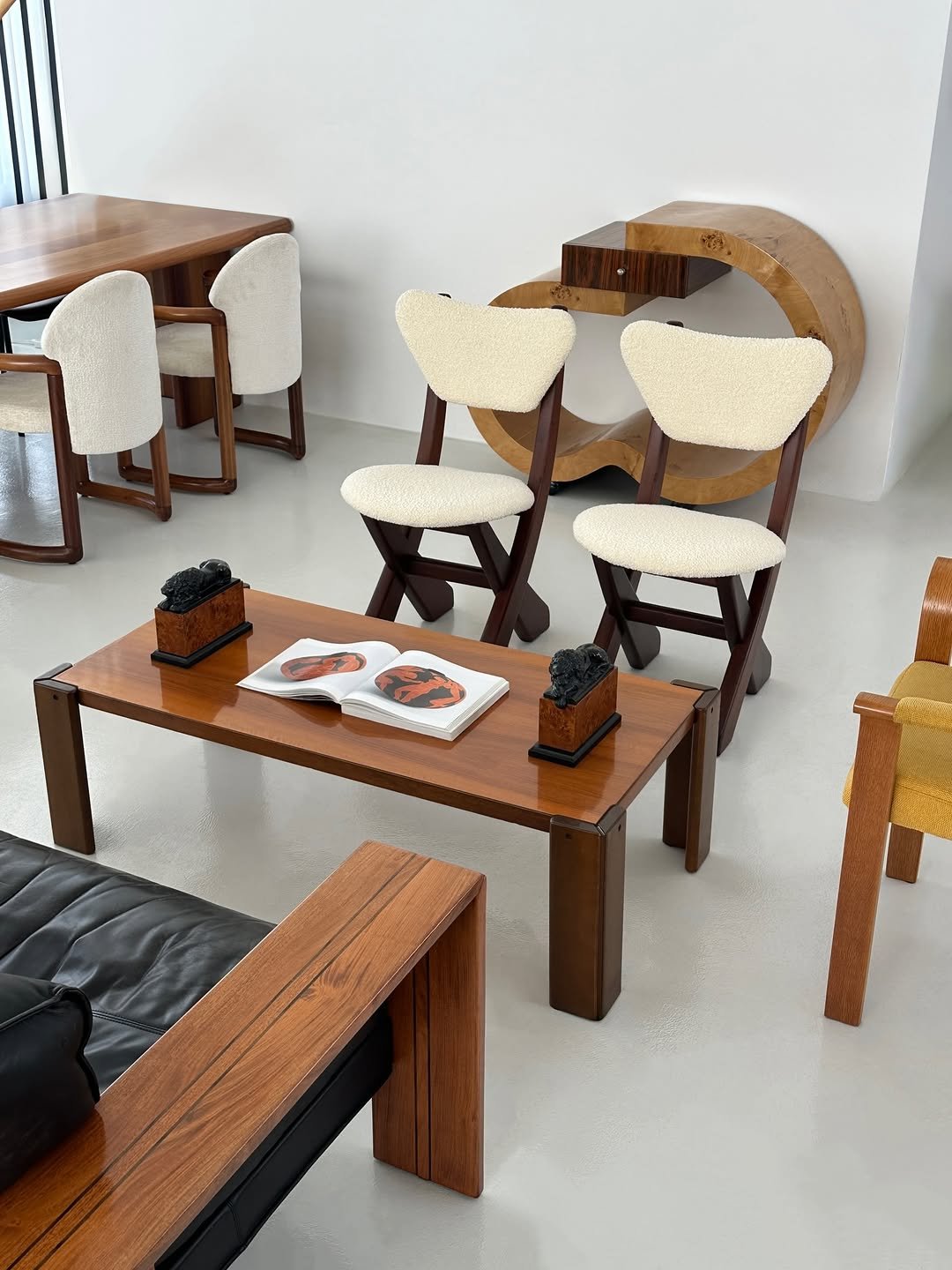 Photo by COLLECTION OF in Collection Of. May be an image of table, sofa, armchair, dining table, indoors and text.