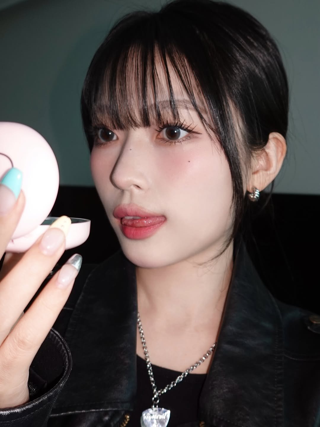 Photo shared by 김은솔 on November 16, 2025 tagging @tooq.official. May be an image of one or more people, lipstick, makeup, hair and text.